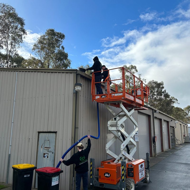 go dynamic group team cleaning gutters in victoria